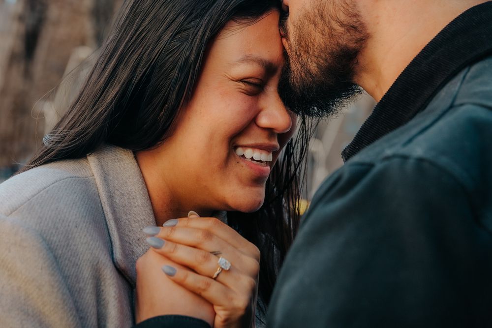 Proposal happening fast in a quiet corner Passion side Sagrada Família Surprise proposal photoshoot Barcelona BarcelonaLoversPH