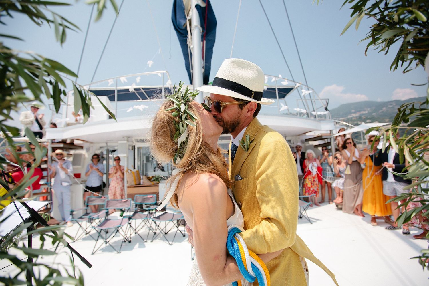 Bride and groom celebrating their yacht wedding on the French Riviera