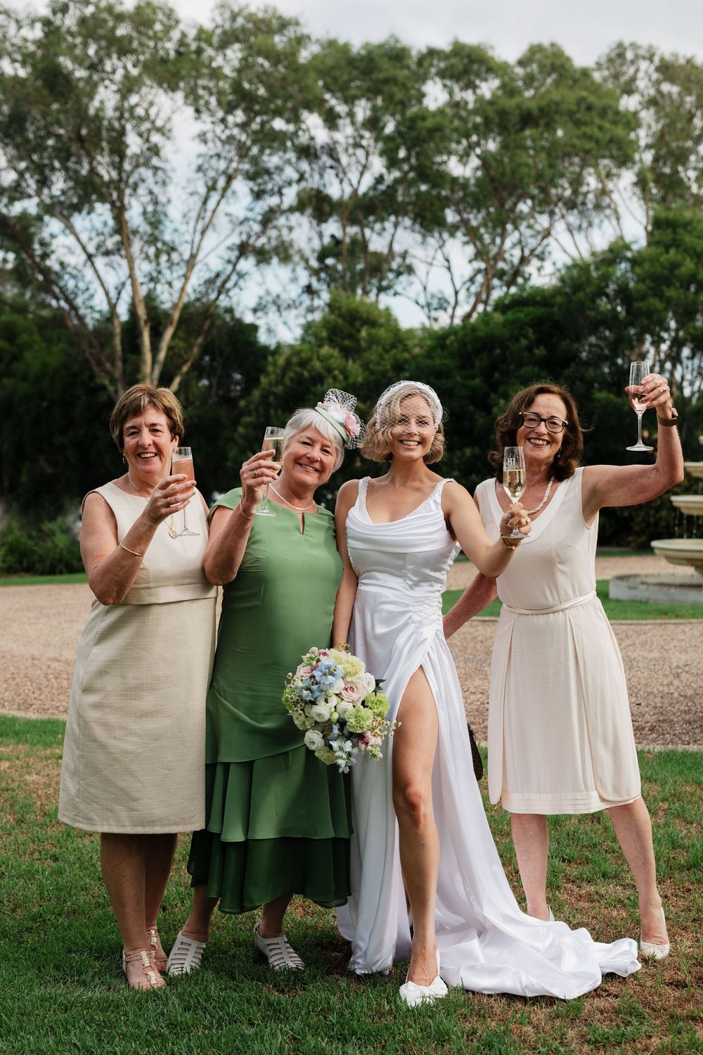 A group in white and green dresses poses together outdoors, showing playful movements in a sequence of candid shots.