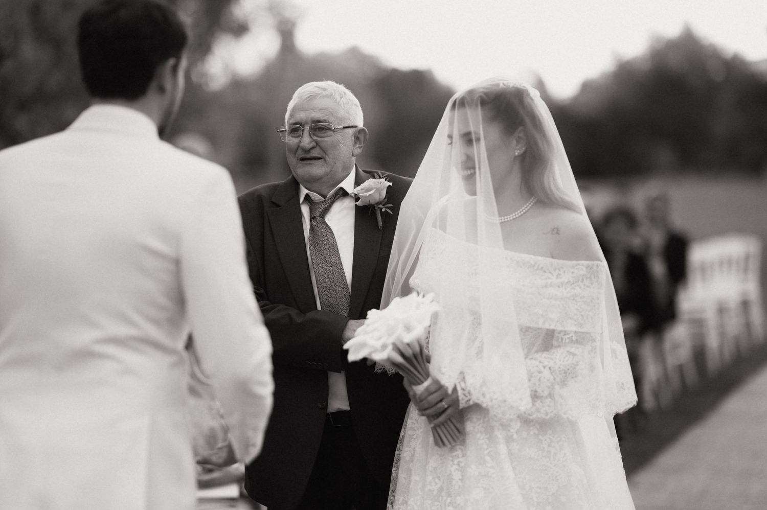 Black and white wedding ceremony photo sequence showing intimate moments between the couple during their vows.