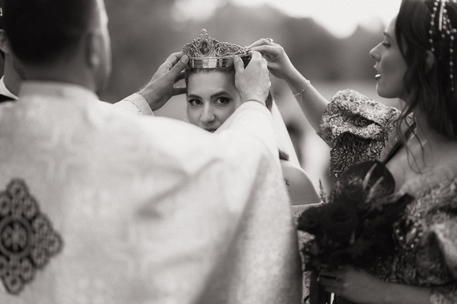 A collection of black and white wedding photography moments showing couples embracing and dancing at their celebration.
