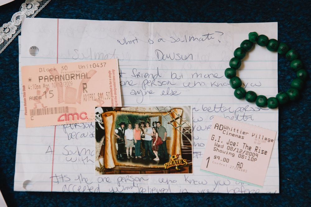 Wedding memory collage with movie ticket, family photo, handwritten notes, and green bracelet.