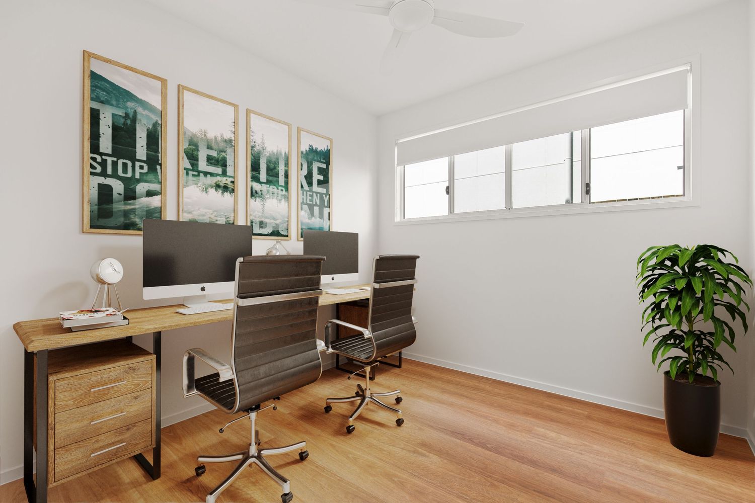 Contemporary home office with dual monitors, timber desk, office chairs, green wall art, and light hardwood floors.