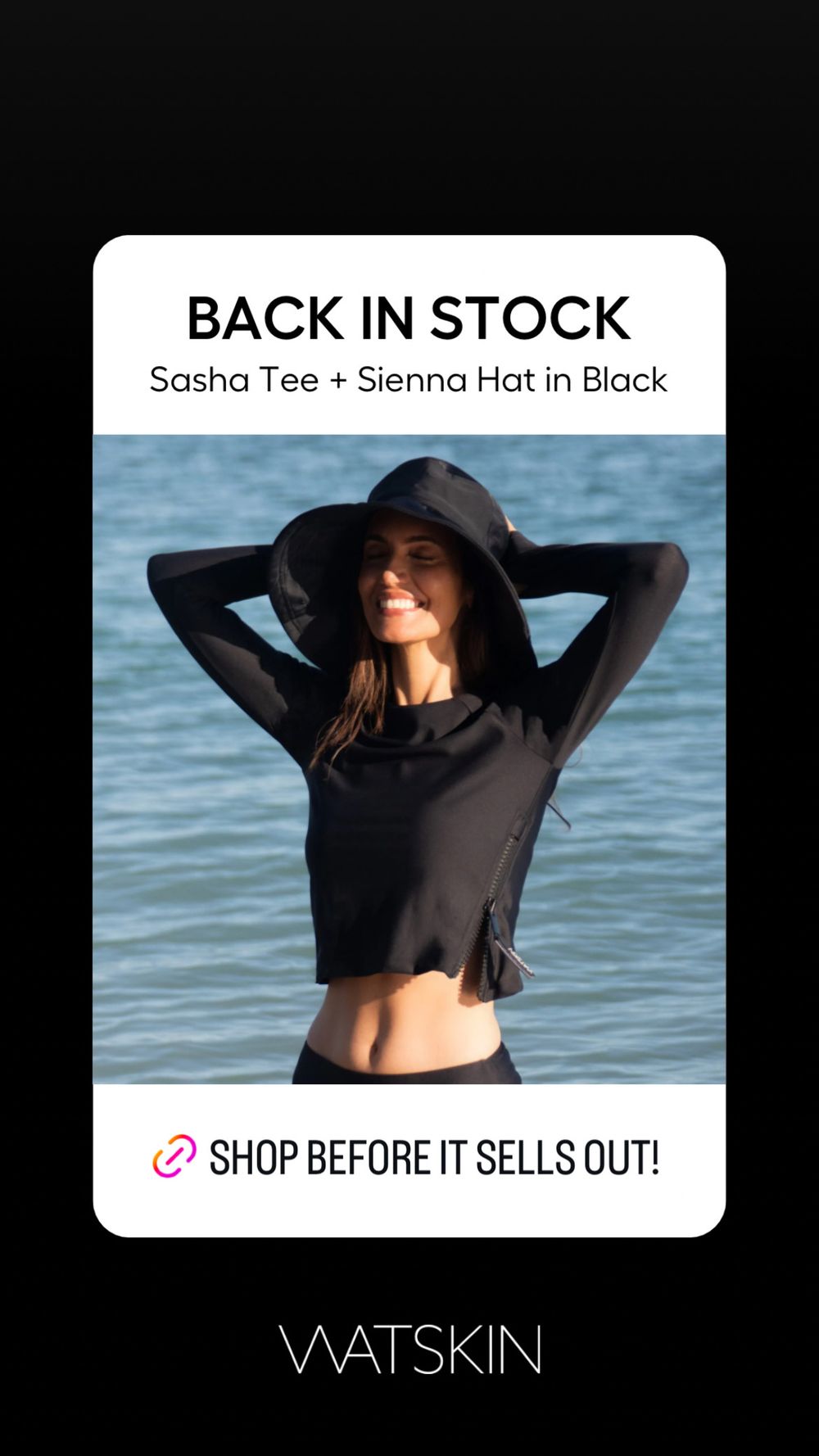 Fashion model in black swimwear and wide-brimmed hat poses against ocean backdrop for Watskin beachwear collection.
