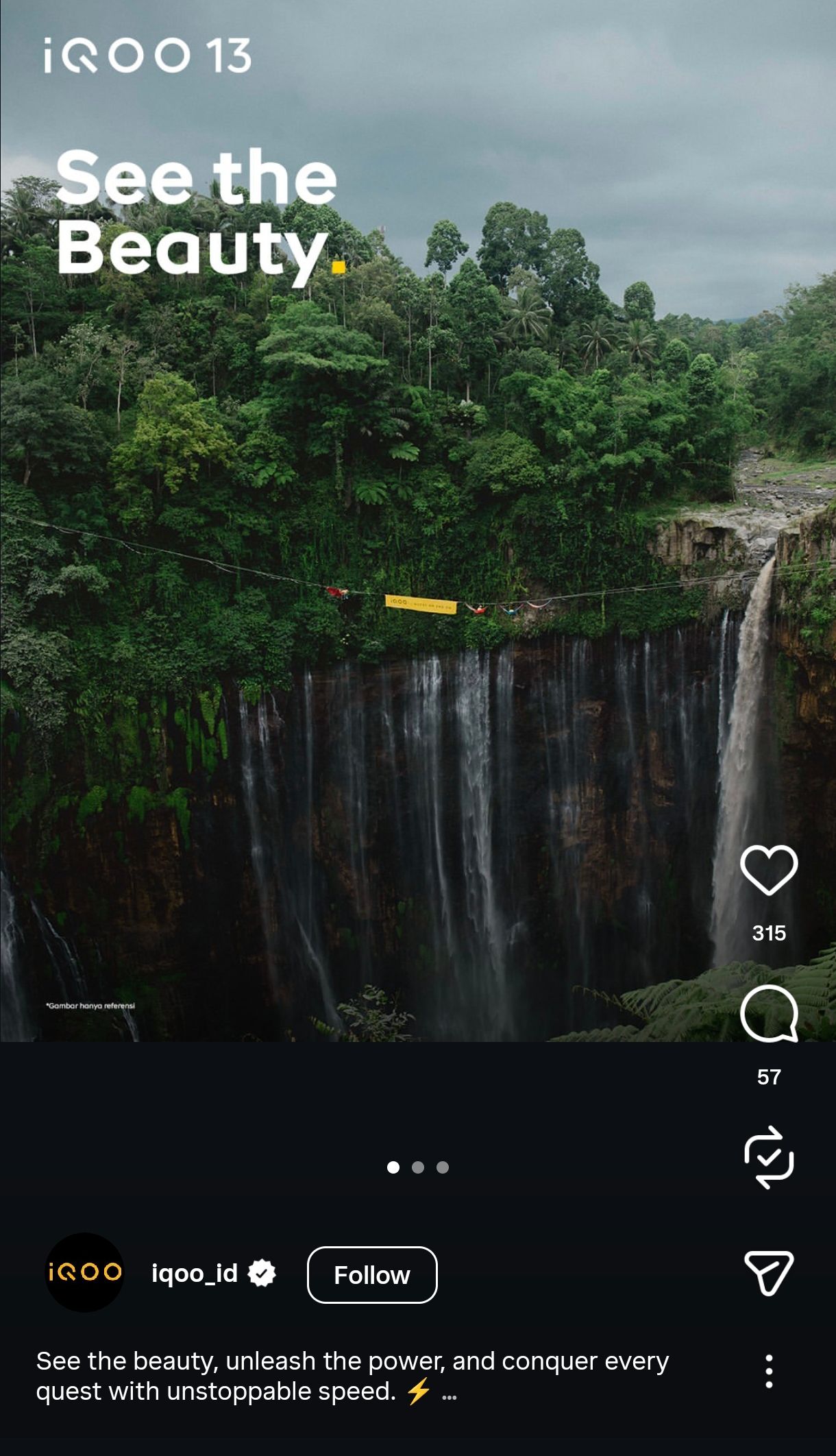 Dramatic waterfall cascades down dark rocky cliffs surrounded by lush green forest in a moody natural landscape setting.