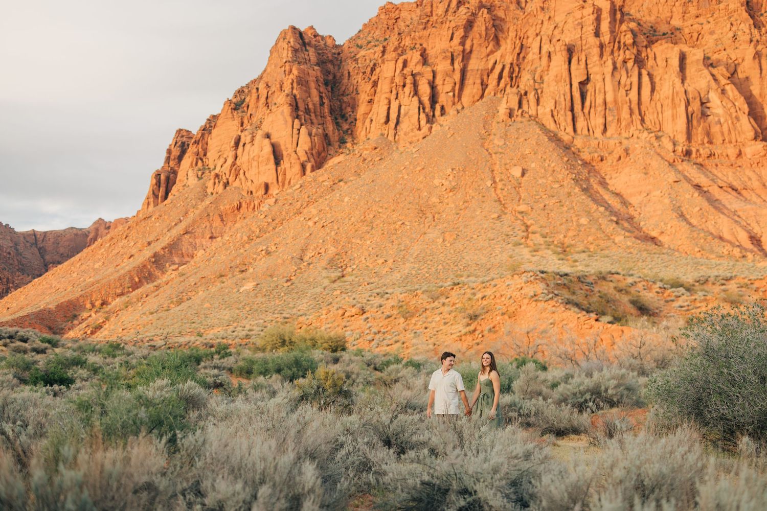 Desert wedding photography session with red rock formations in the background at Snow Canyon State Park.