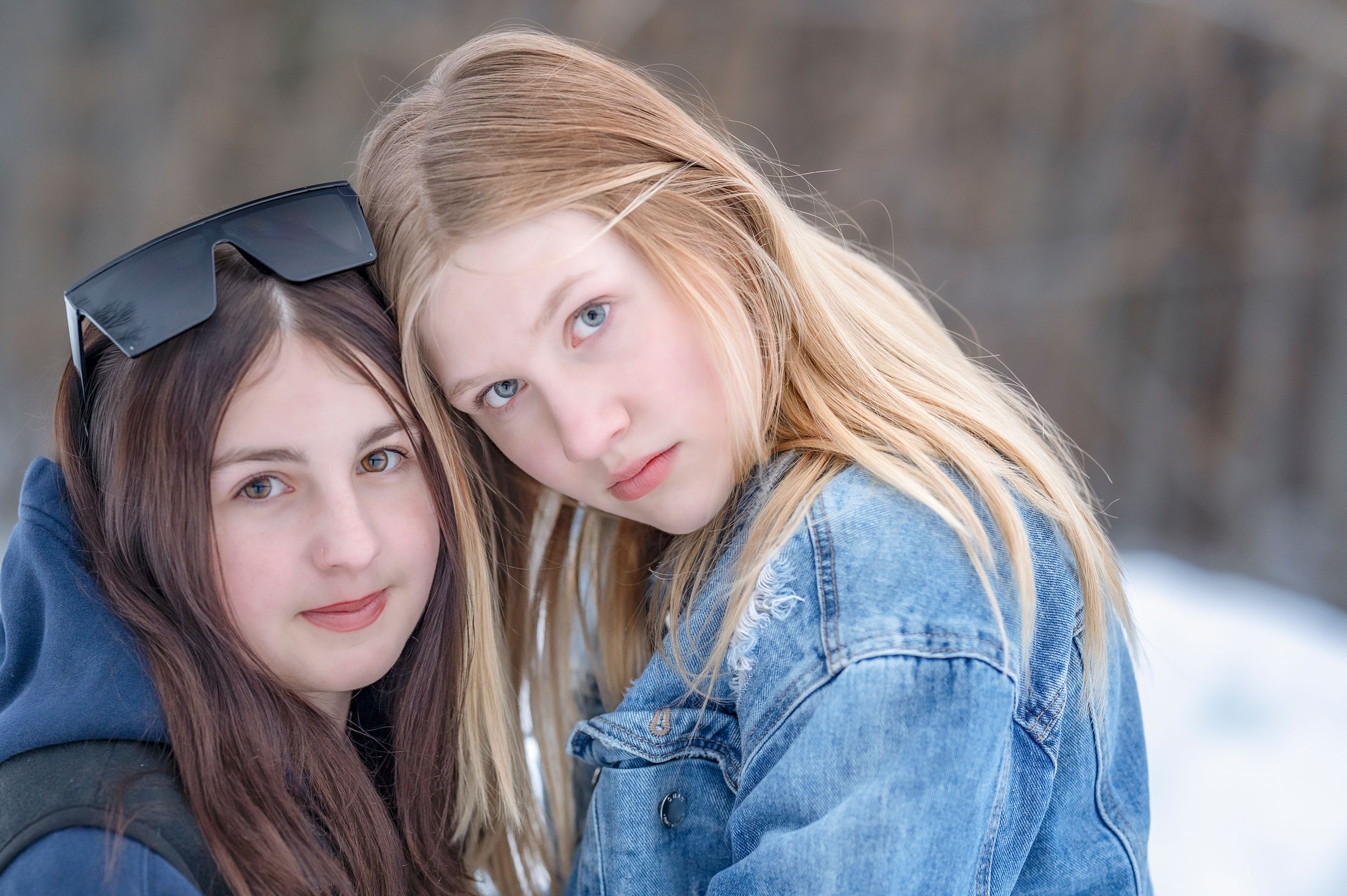 A collection of casual outdoor portraits featuring two people in denim and light clothing.