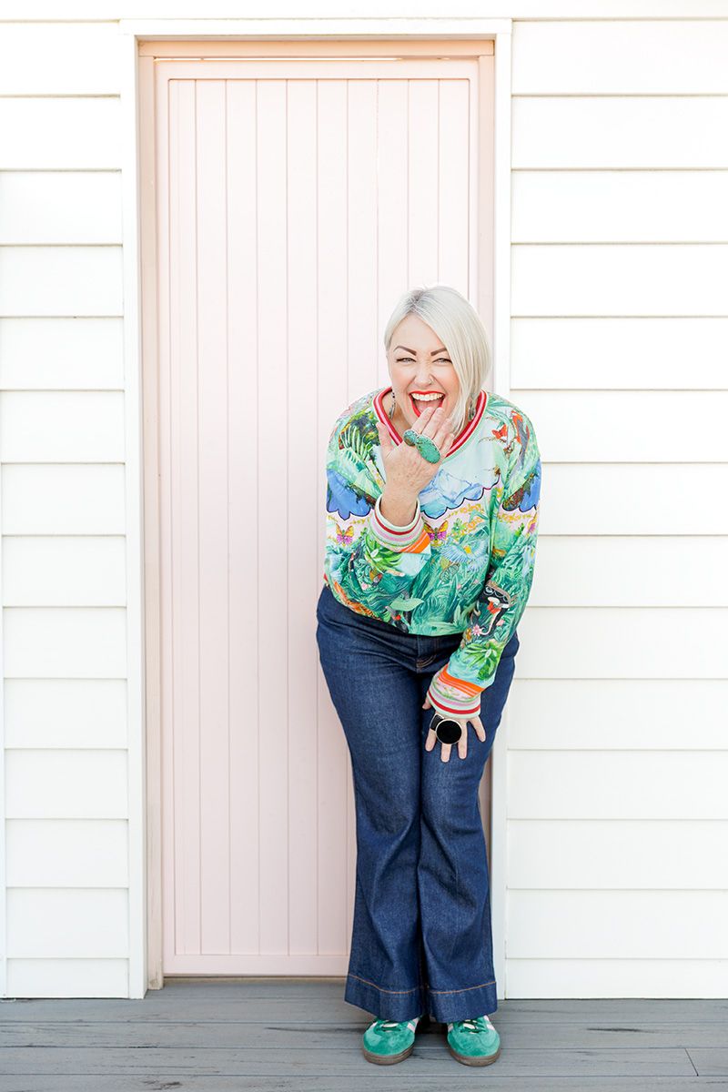 Business photography Adelaide — female business owner full-length portrait, laughing