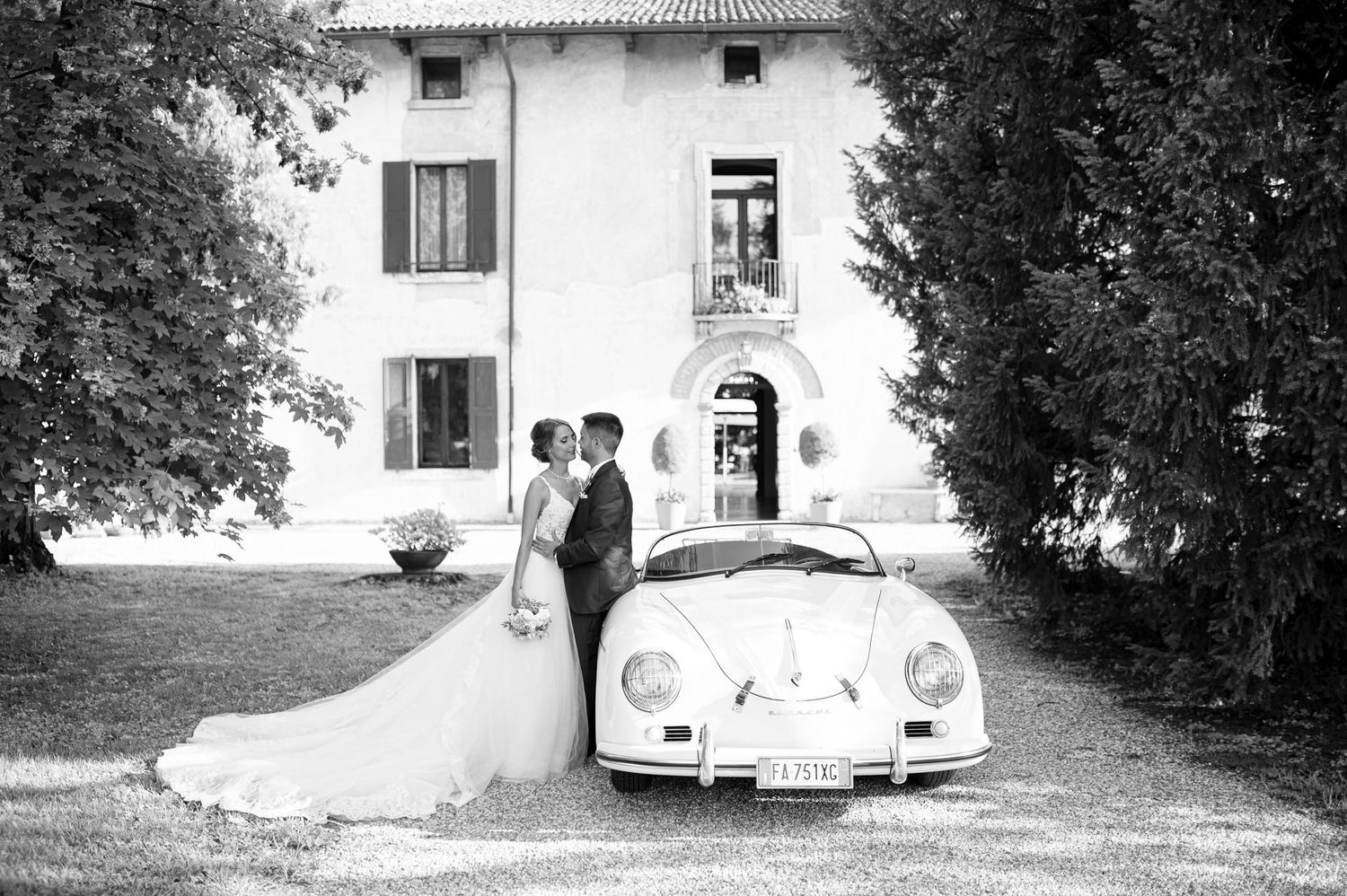 Romantic bride and groom portrait in the gardens of Villa Giona wedding venue