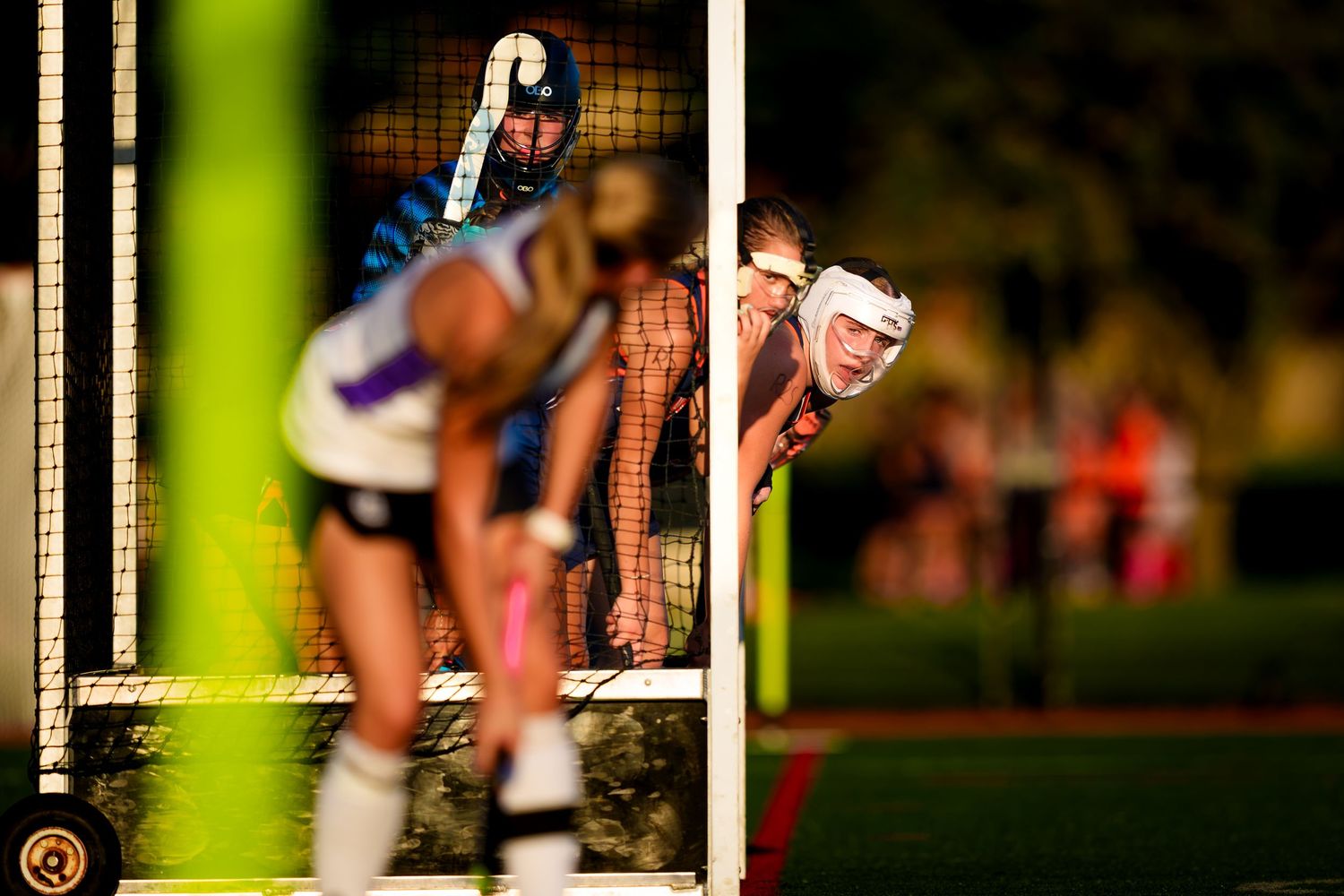 Hershey Trojans field hockey player battles at the goal vs Mifflin County, by Deanna Fox, SportsFox Photography based in Hershey PA
