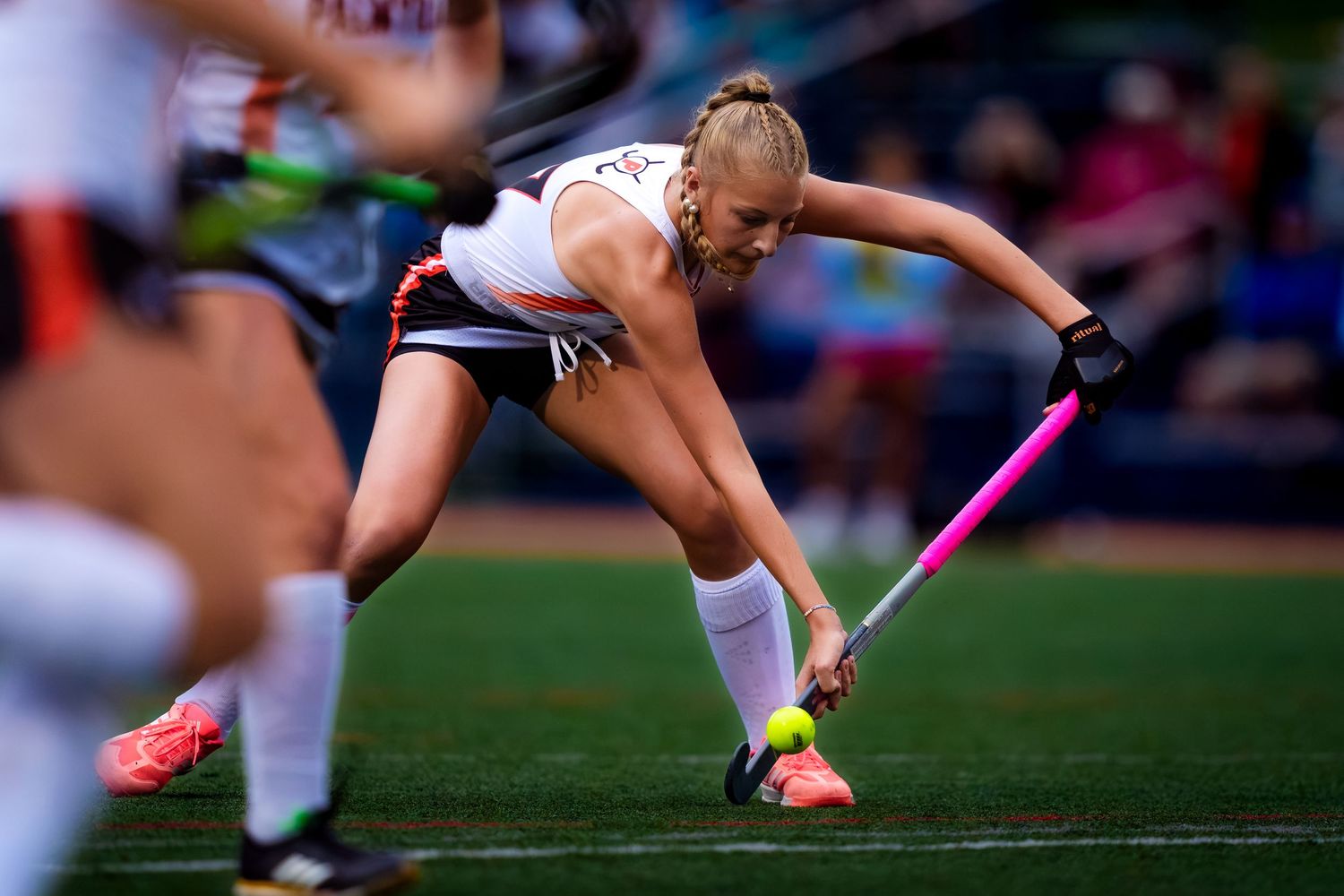 Hershey Trojans field hockey player sweeps the ball in a game vs Palmyra, by Deanna Fox, SportsFox Photography based in Hershey PA