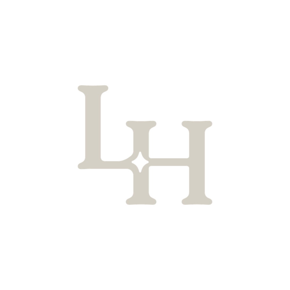 Elegant LH monogram logo in beige tones featuring intertwined letters with a subtle star accent.