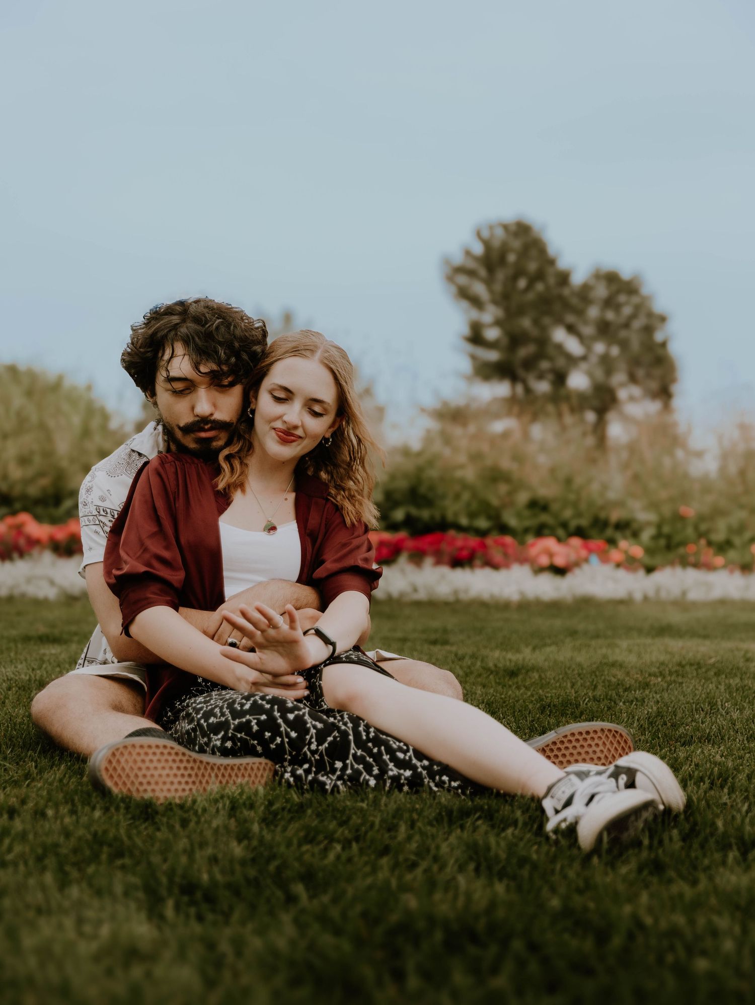 Couple embraces each other for candid couples, engagement photos, elopement, and cinematic photos in Denver, Colorado