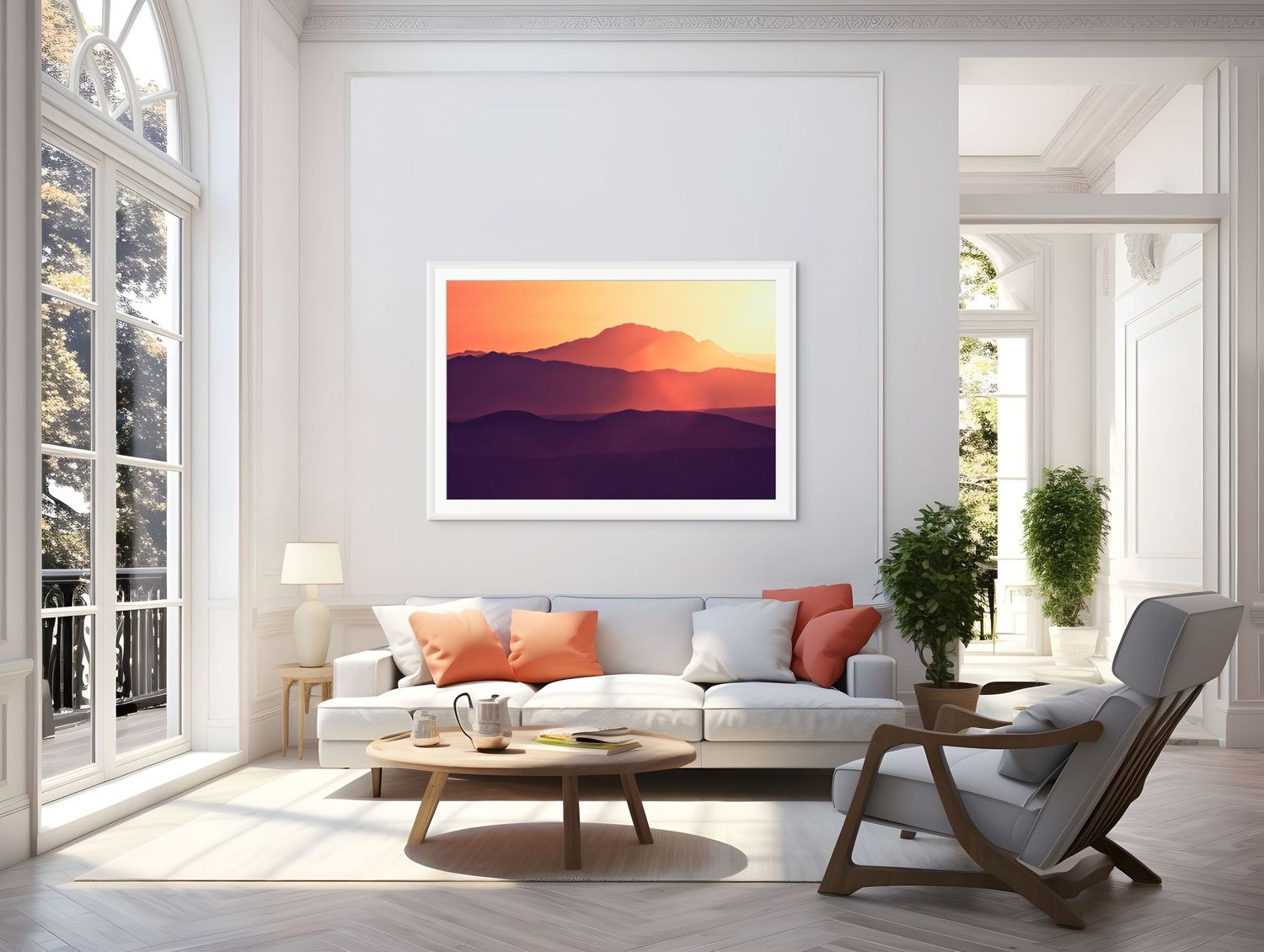 Framed mountain sunset landscape print with purple hues on living room wall above sofa and rattan chair.