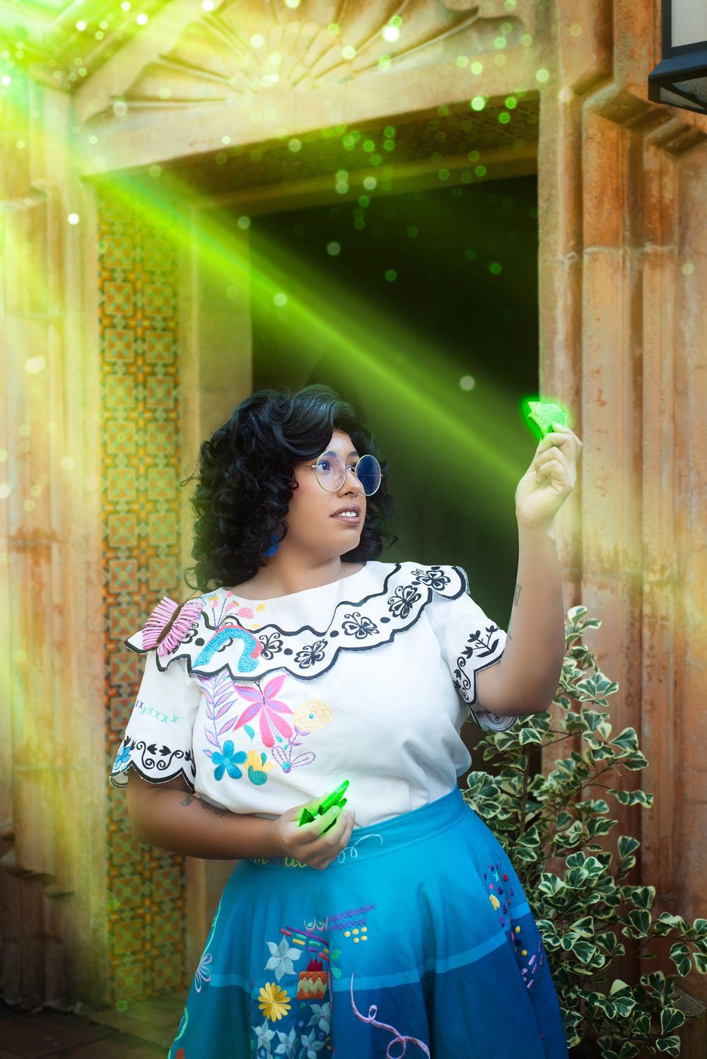 Outdoor cosplay solo session of Disney's Mirabel at Bok Tower in Florida. Dynamic light affects and posing, composite like editing