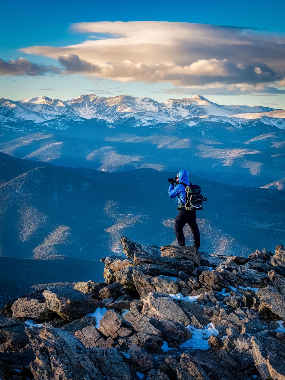 Sunset shot of a photographer on a mountain top by Denver Hospitality, Travel & Tourism photographer Captain Colorado Photography.