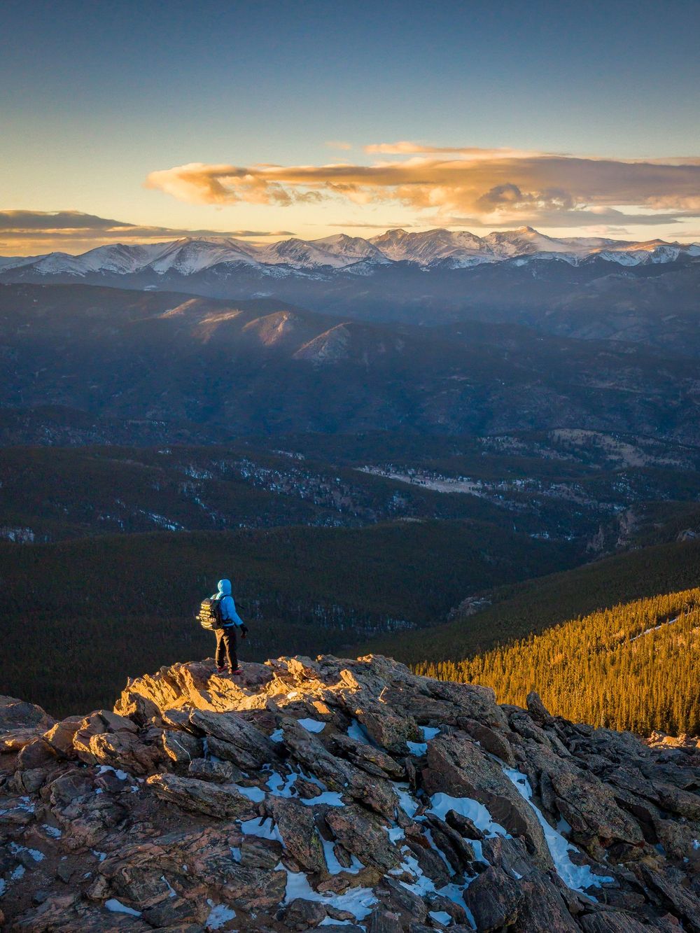 Sunset shot of a photographer on a mountain top by Denver Hospitality, Travel & Tourism photographer Captain Colorado Photography.