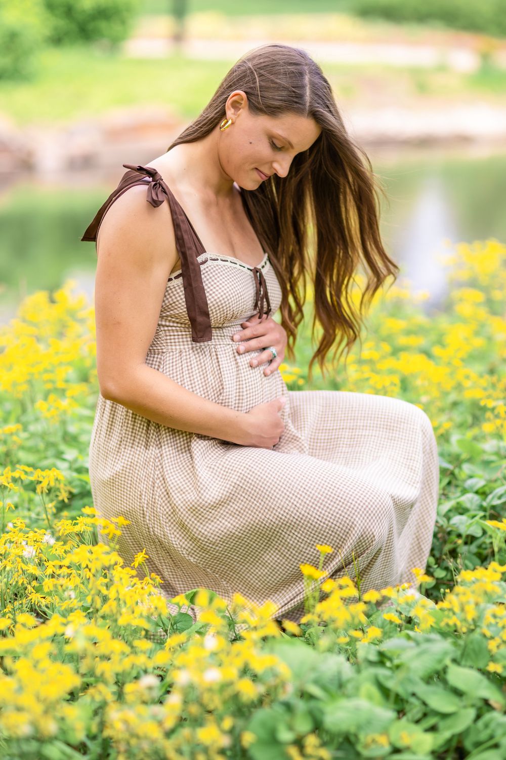 Intimate portrait of a mother expecting her third and final baby