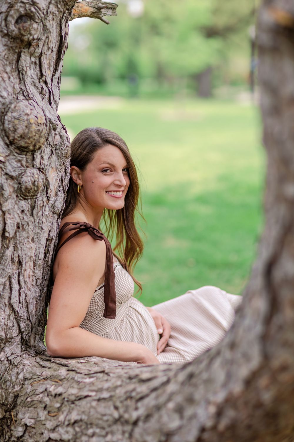 Quiet joy and reflection during a spring maternity session in Wichita