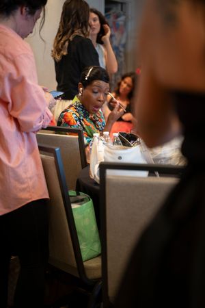Guest seated at tables sociallizing during the 2026 North Carolina Azalea Festival Spring Fashion Show