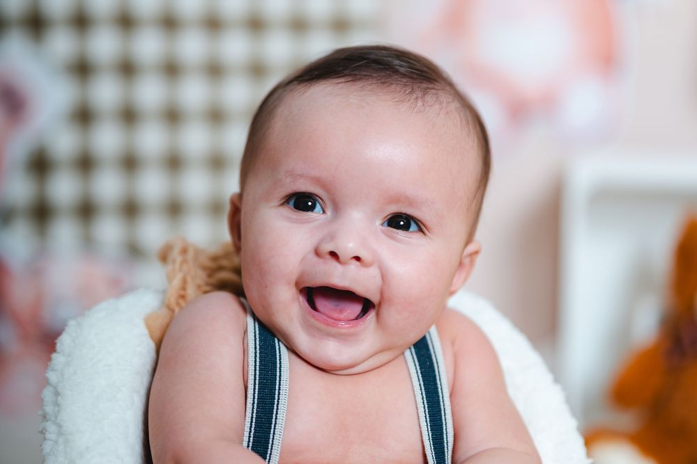 4 month baby photoshoot in New Jersey capturing personality and early interactions