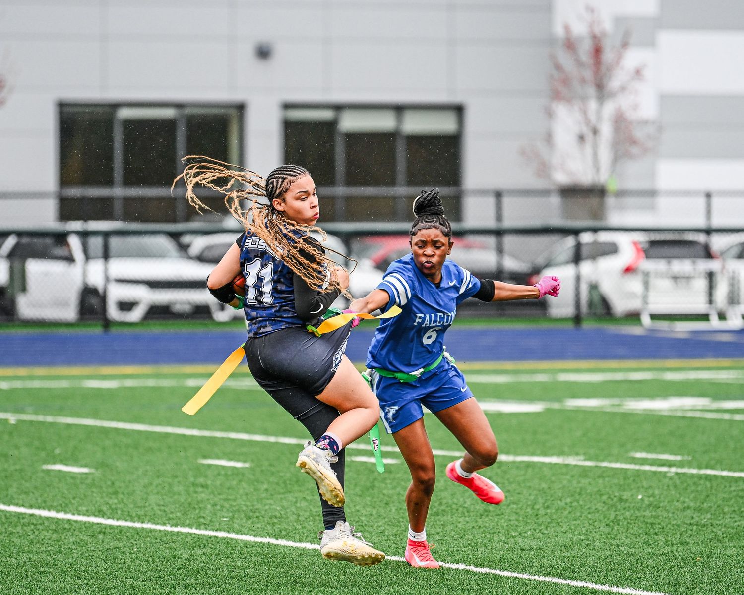 Girls flag football players compete for possession during an intense match. Buffalo ny sports photographer, forge city sports media