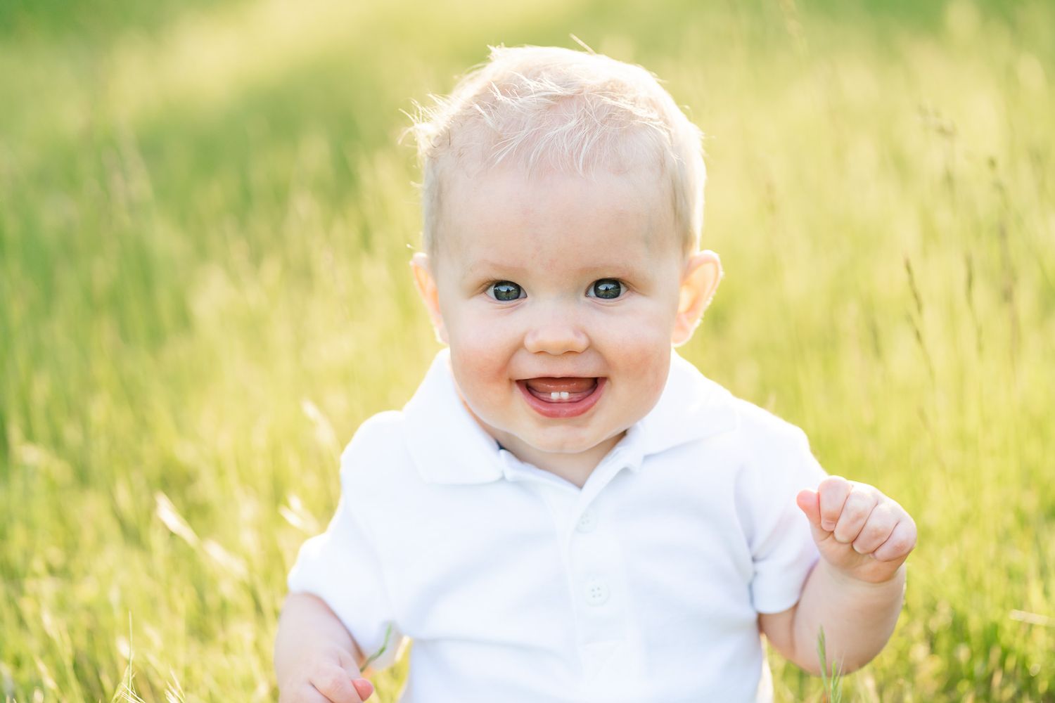 Baby smiling at the camera