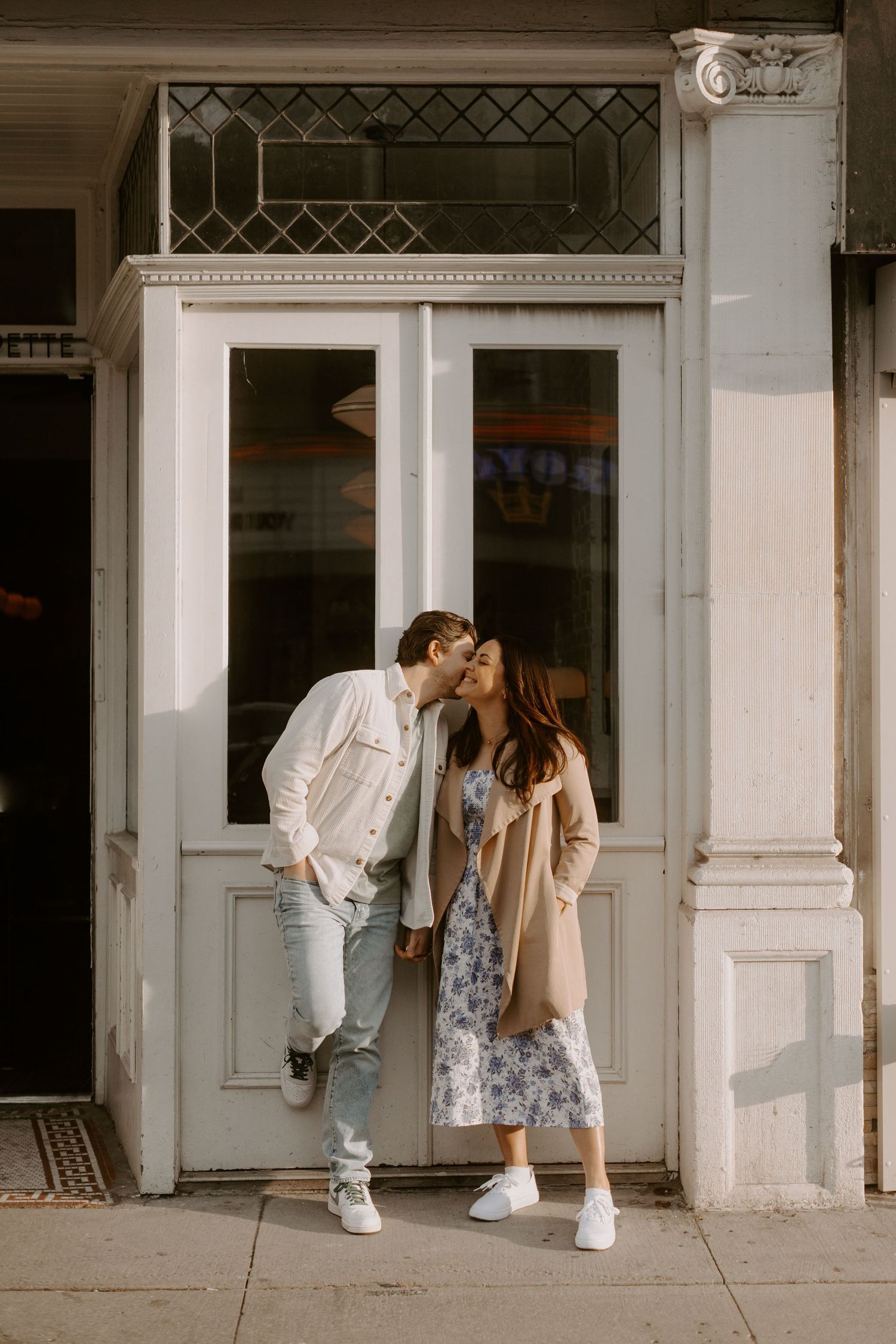 A candid city engagement session photography on College West St in Toronto
