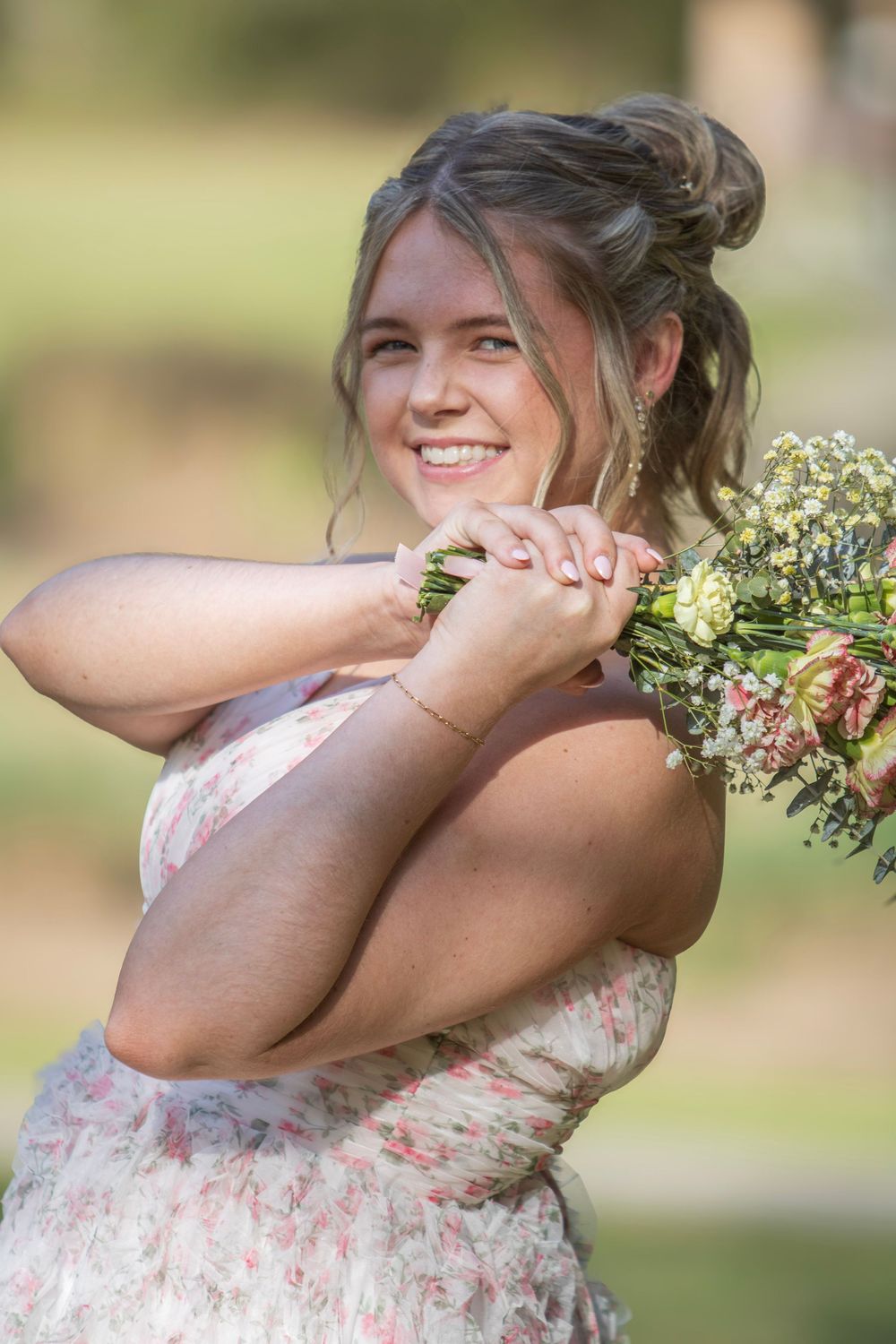 A sequence of photos shows someone in a floral dress playfully hiding their face behind their arms in an outdoor setting.