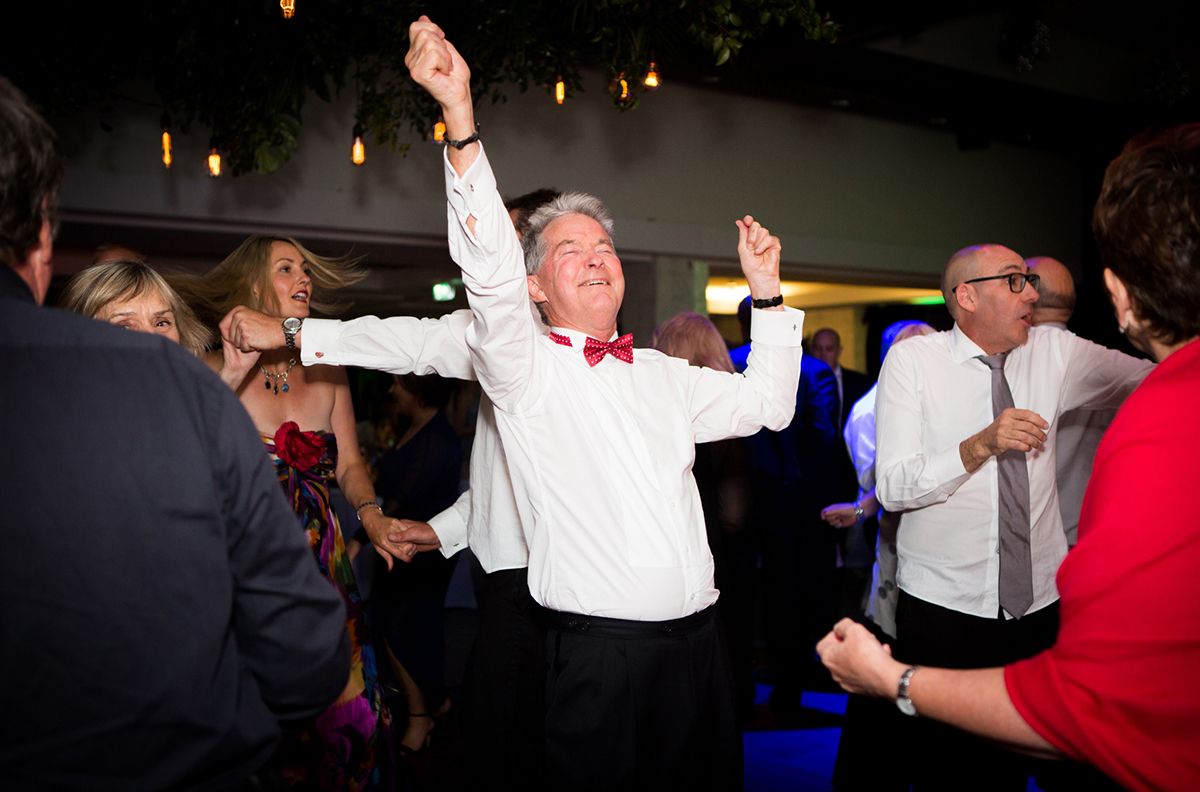 A guest dancing on the dance floor at a charity fundraising event