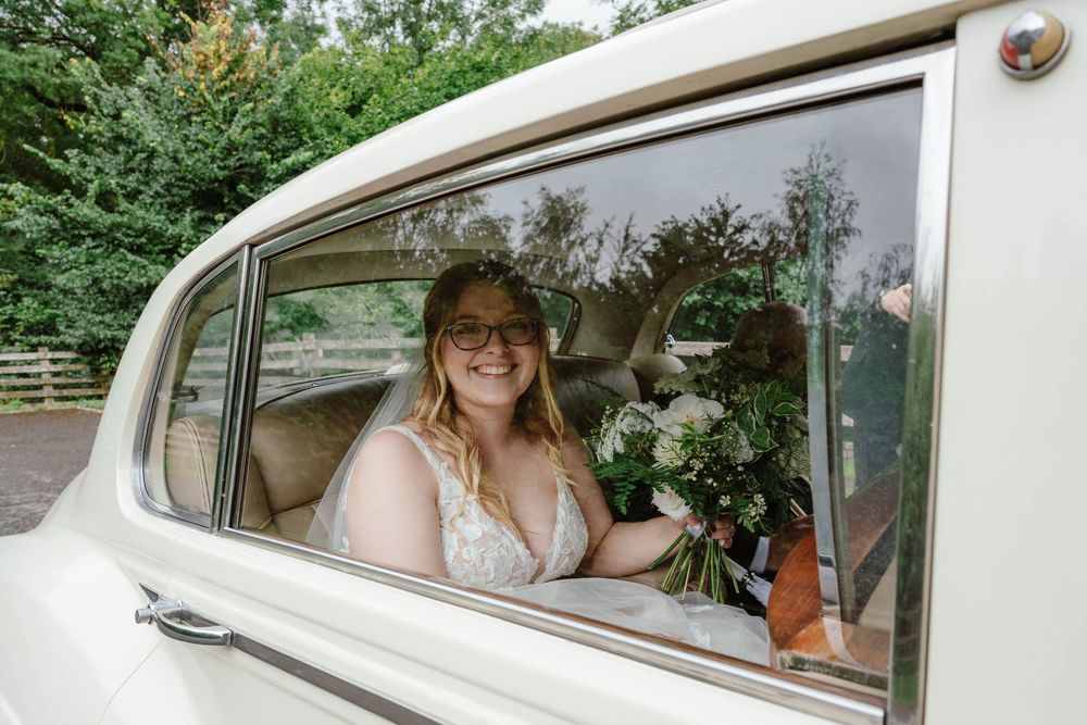 Bath Wedding Photographer Zara Davis Photography Cotswolds Wick Farm Bath  bride arriving in vintage car