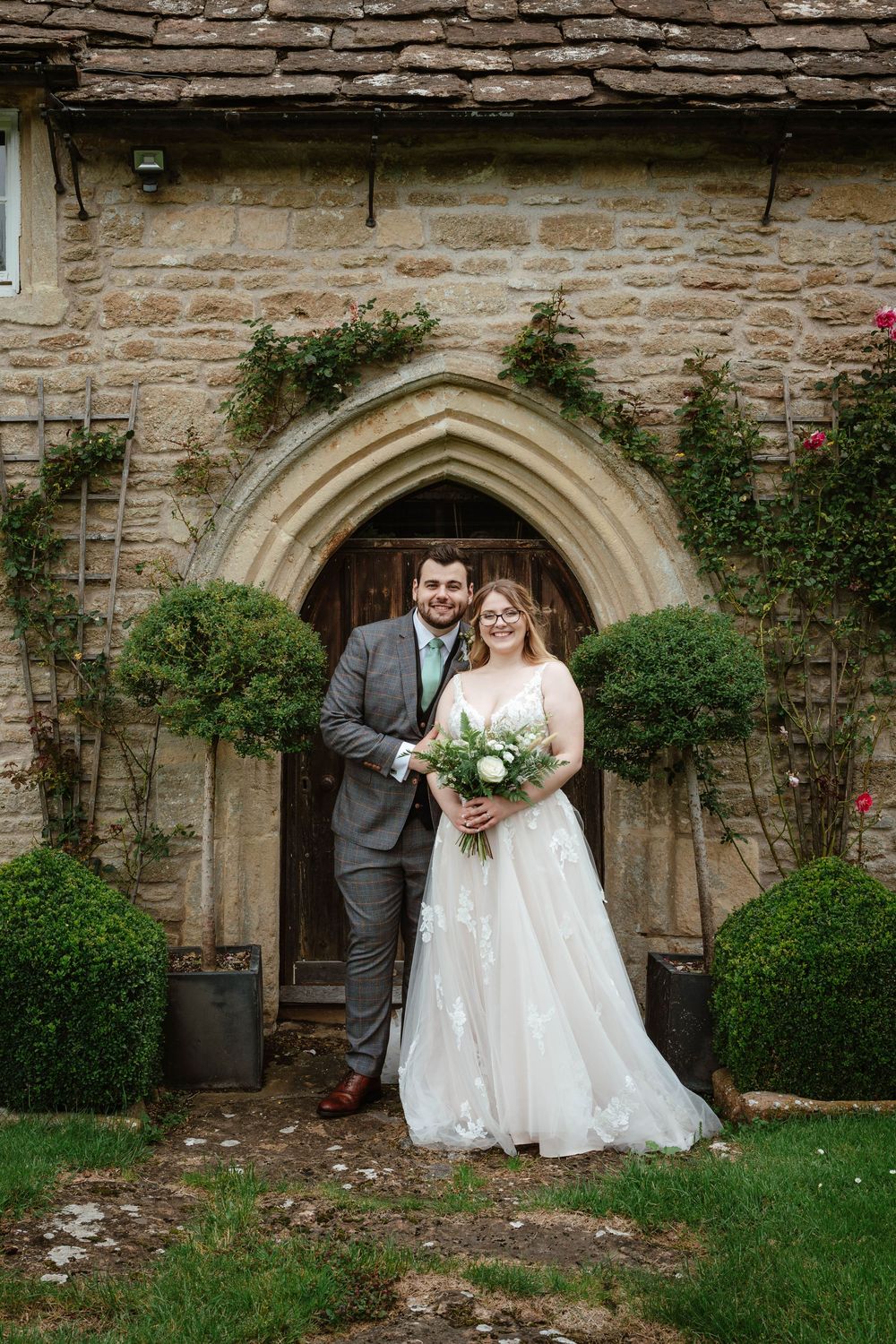 Bath Wedding Photographer Zara Davis Photography Cotswolds Wick Farm Bath bride and groom under the arch
