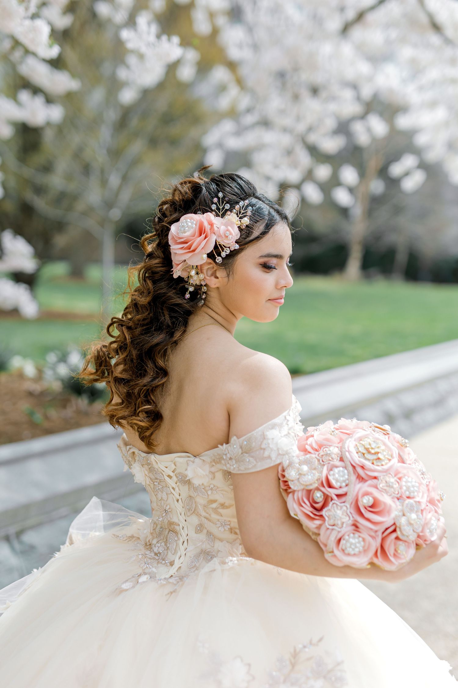 Elegant quinceanera portrait series featuring a person in a champagne ballgown and tiara posing gracefully against light backdrop.