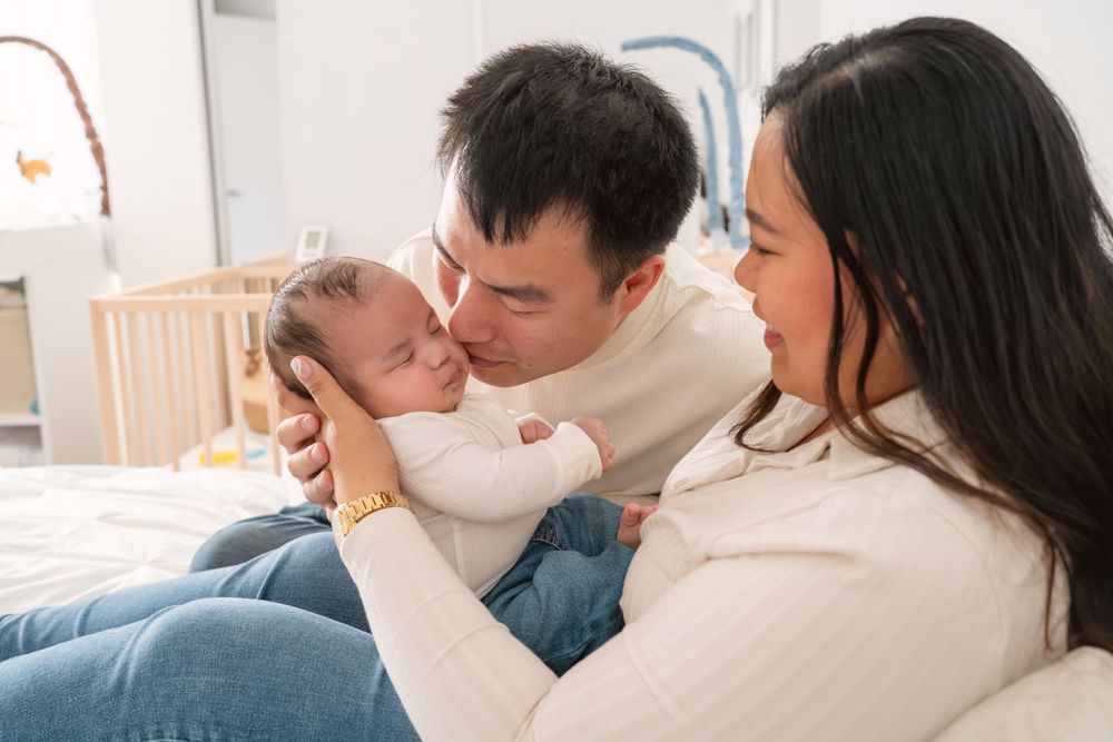 A series of tender moments between parent and baby shown in multiple connected photos against a light background.
