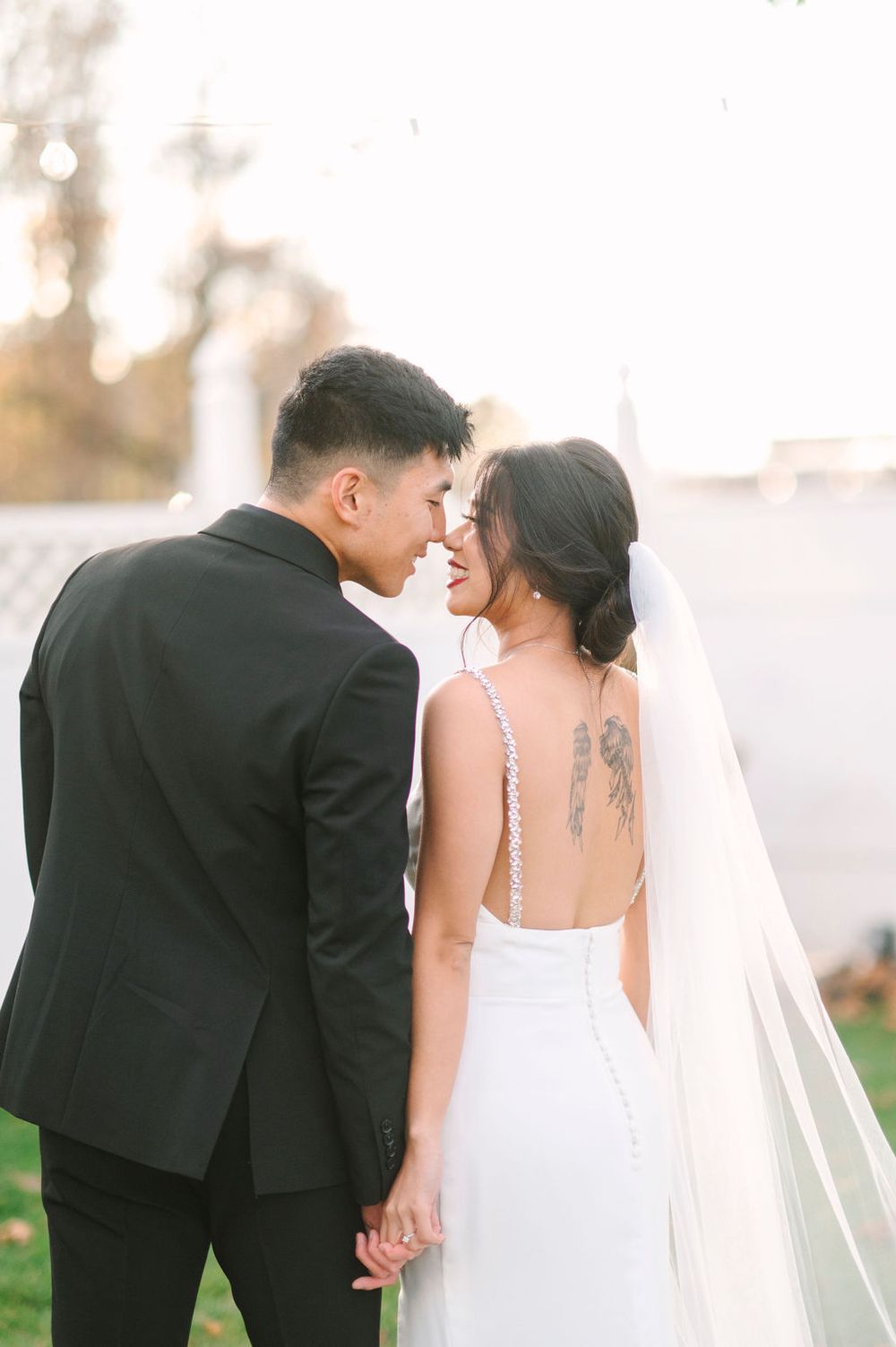 Intimate wedding photography sequence showing romantic moments between newlyweds at sunset.