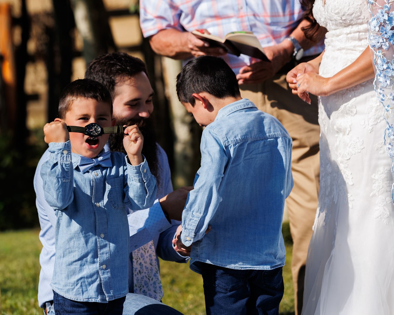 Bride's son receives a watch from the groom.