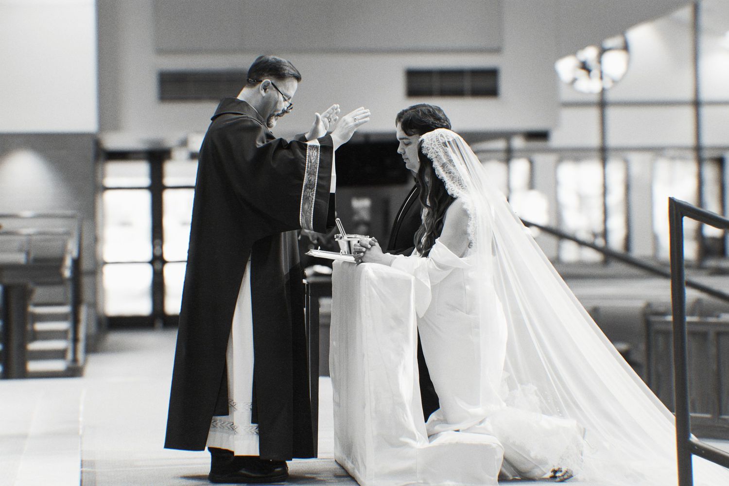 Black and white wedding photos displayed in a collage showing romantic moments between newlyweds.