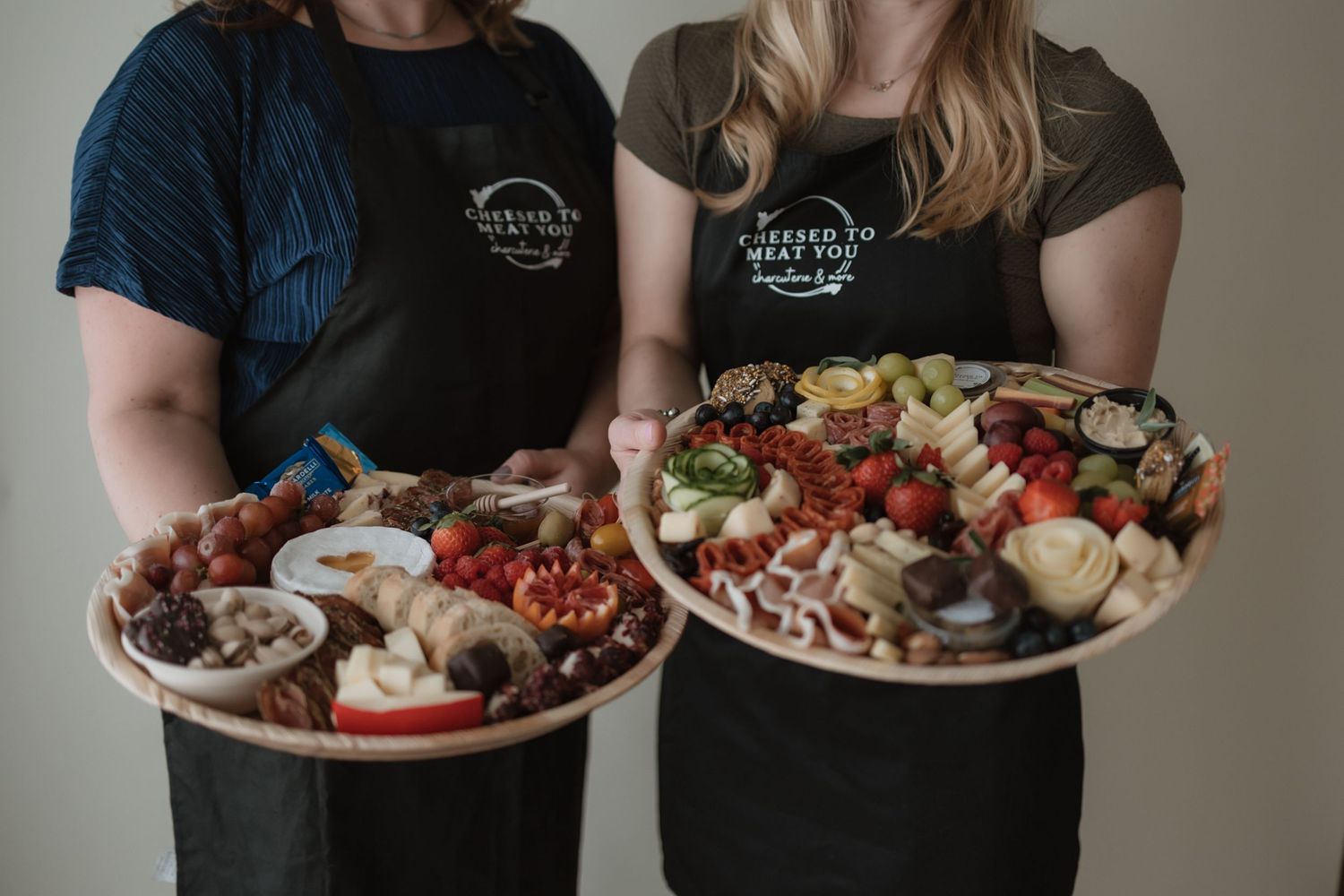 A sequence of photos showing friends gathering around a charcuterie board and sharing food at a casual indoor gathering.