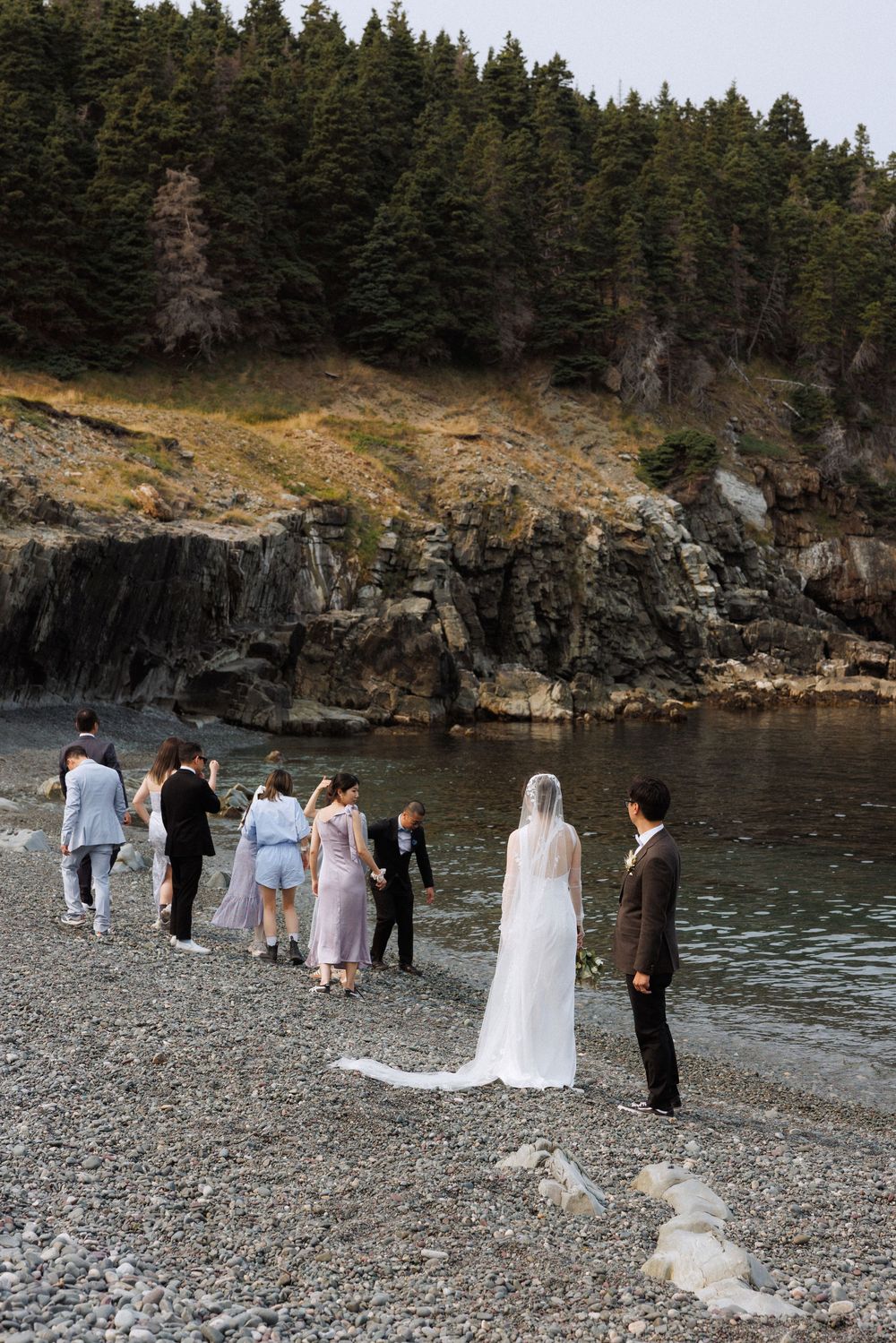Wedding at Middle Cove Beach, captured by Newfoundland documentary style wedding photographer Kaitlyn Yvette