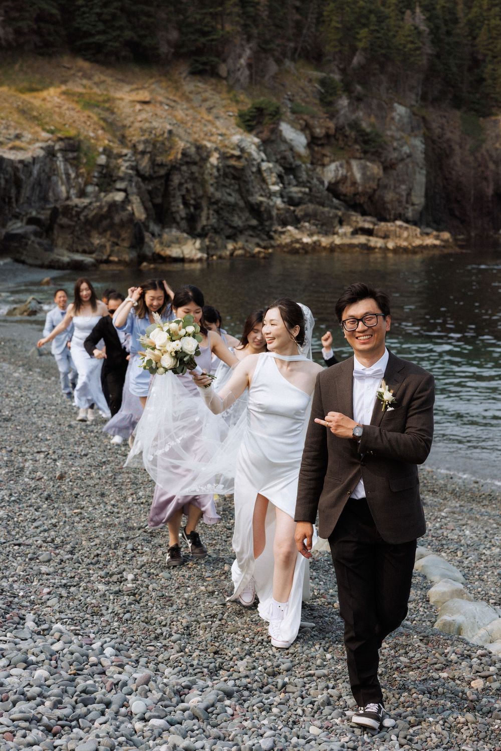 Wedding at Middle Cove Beach, captured by Newfoundland documentary style wedding photographer Kaitlyn Yvette