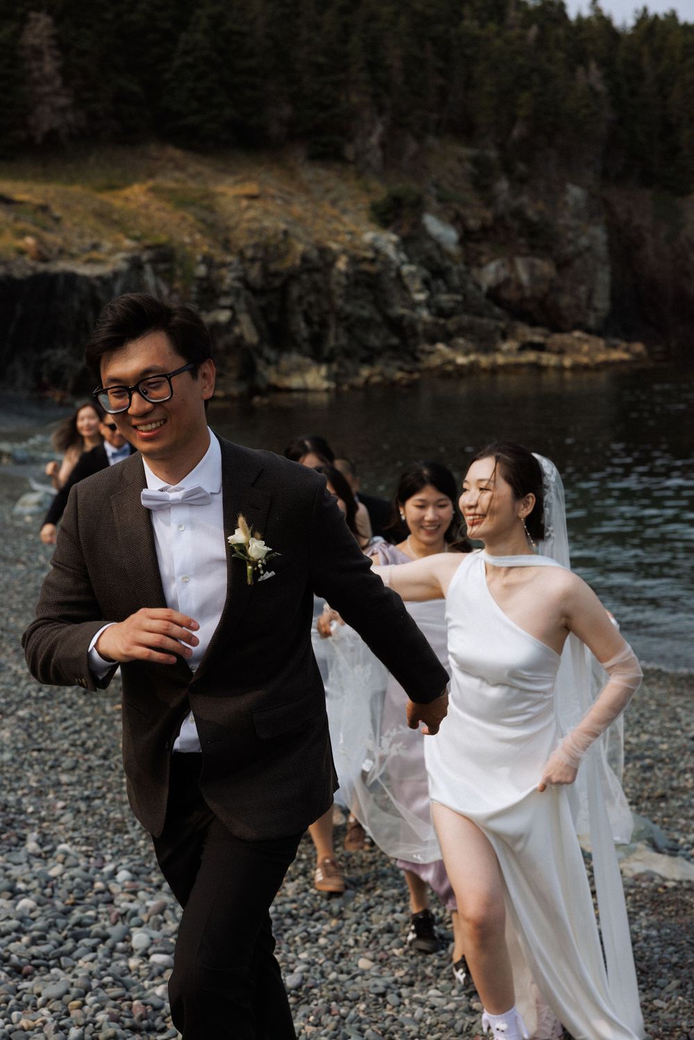 Wedding at Middle Cove Beach, captured by Newfoundland documentary style wedding photographer Kaitlyn Yvette