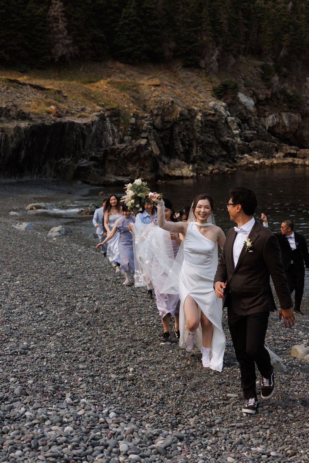 Wedding at Middle Cove Beach, captured by Newfoundland documentary style wedding photographer Kaitlyn Yvette