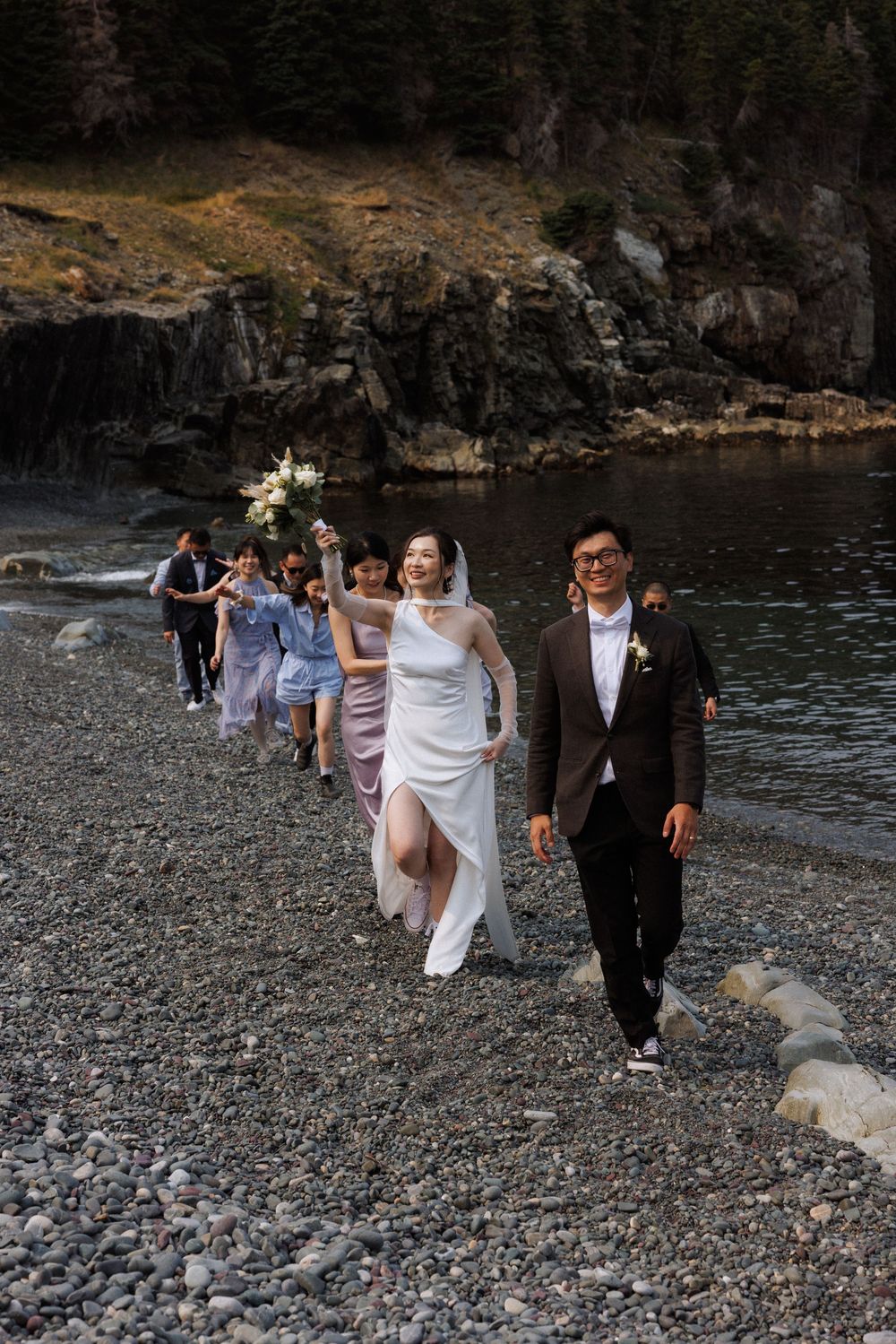 Wedding at Middle Cove Beach, captured by Newfoundland documentary style wedding photographer Kaitlyn Yvette