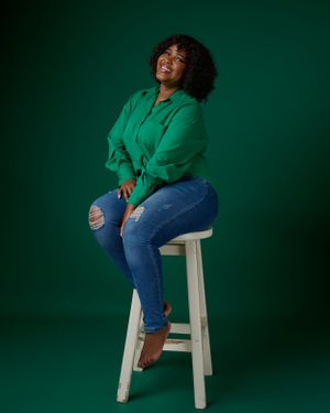 lady seating on a stool