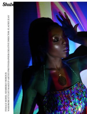 Artistic nightclub photo with colorful neon lights and sparkly fashion.