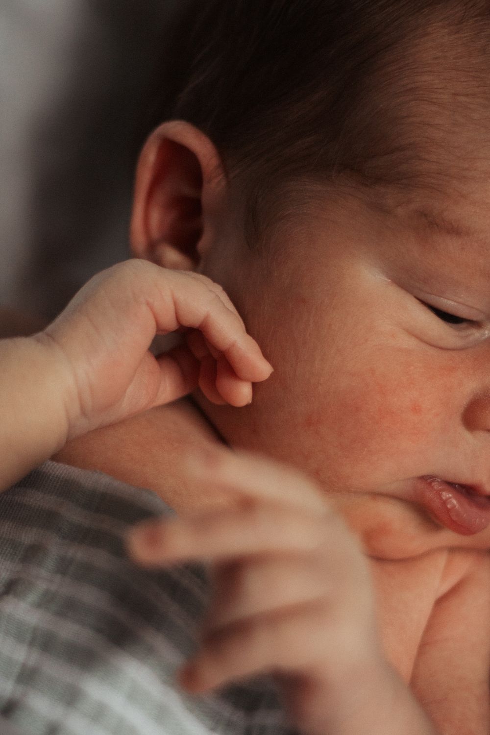 Close-up of a sleeping baby's delicate features.