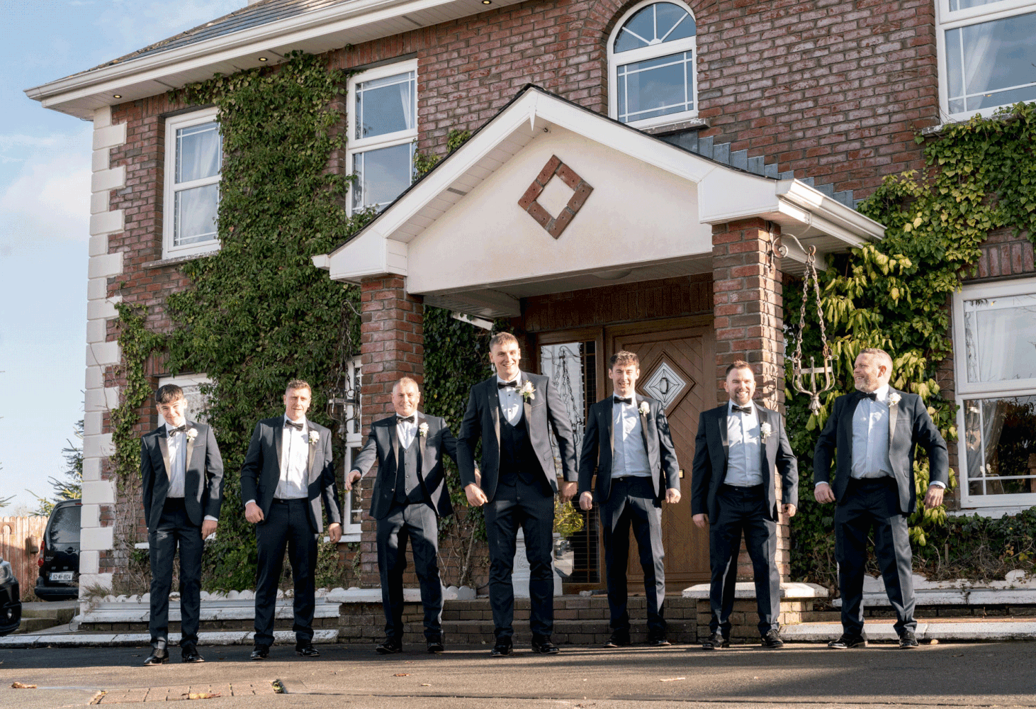 Groom preparation in county Cavan. Mans in suits jumping up and down. Happy. moving gif.