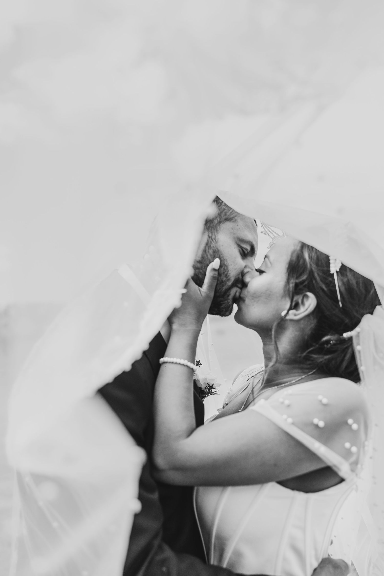 Romantic black and white portrait through flowing veil from Kate Lafferty Photography