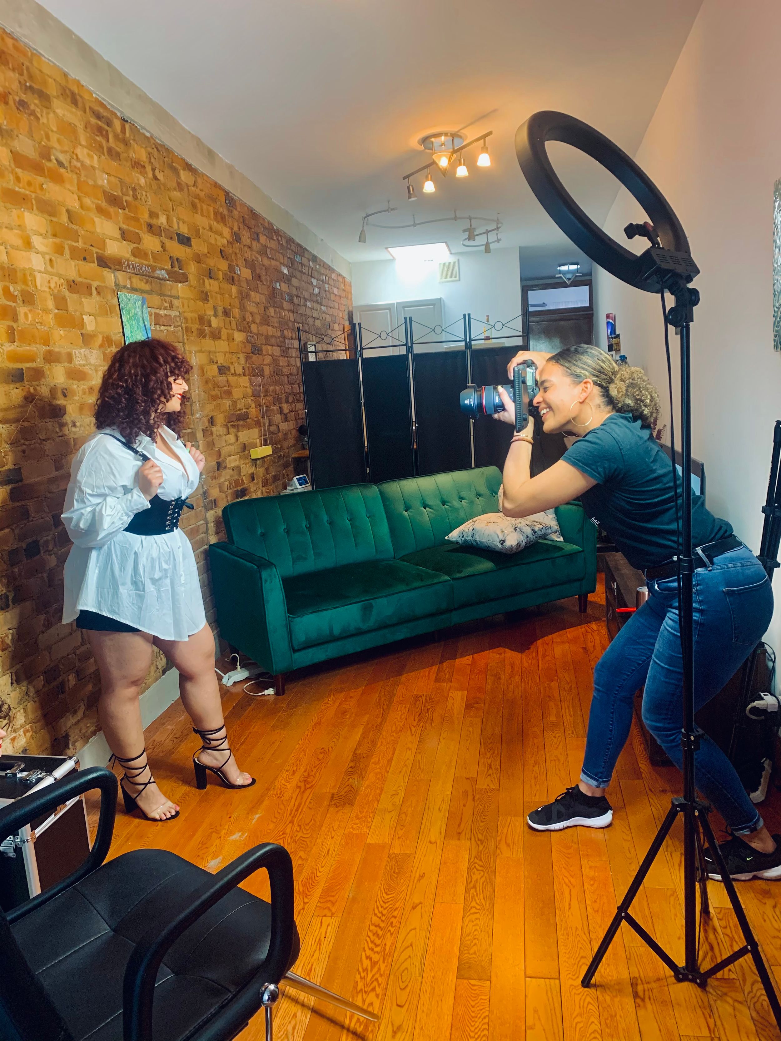 a photographer doing a session of a young lady