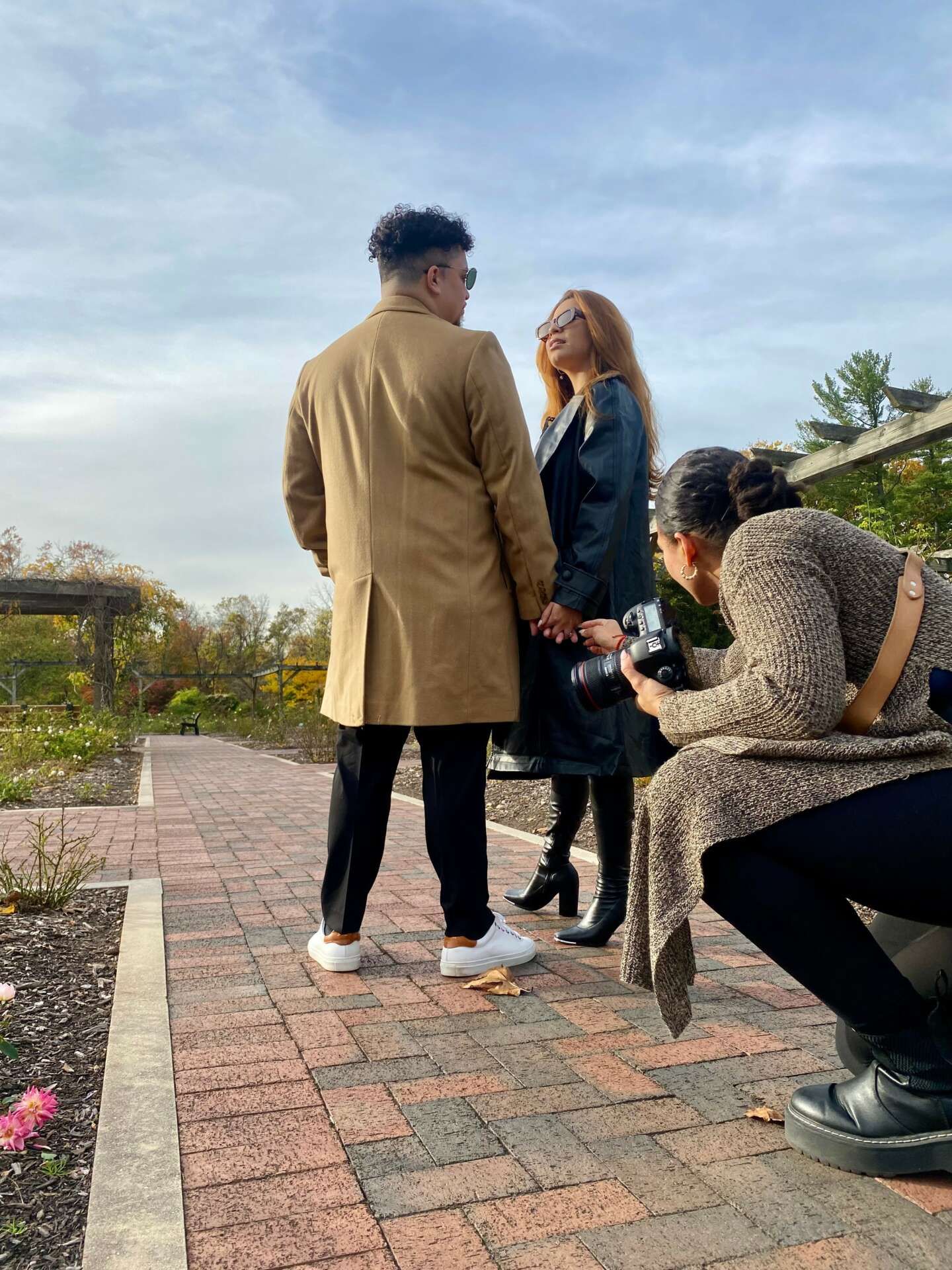 a photographer capturing a couple
